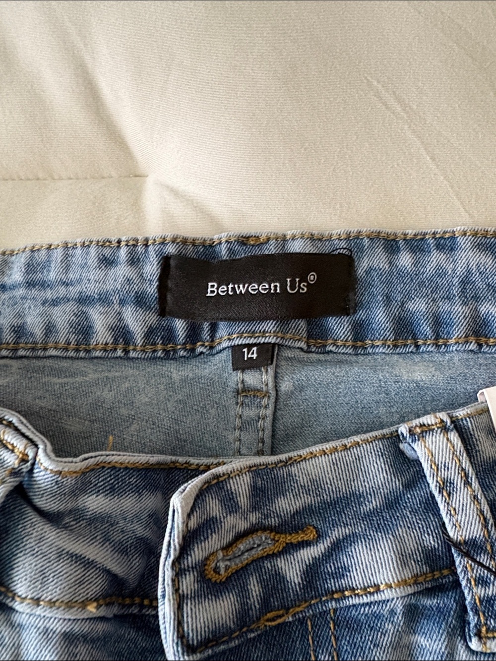 Light Blue Women’s High-Rise Bow Jeans - Picture 2 of 3